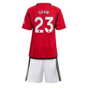 Luke Shaw #23 Manchester United Hjemmebanesæt Børn 2023-24 Kort ærmer + korte bukser
