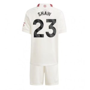 Luke Shaw #23 Manchester United Tredje trøje Børn 2023-24 hvid Kort ærmer + korte bukser